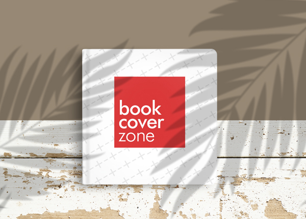 Square Book Mockup on Rugged Wooden Floor