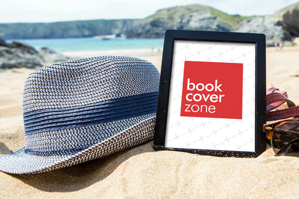 Black Kindle E-book Reader on Beach
