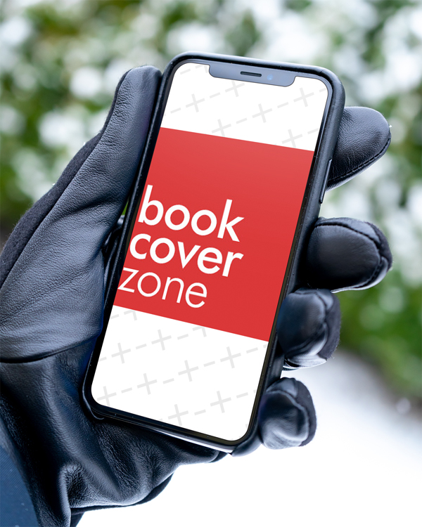 Man Holding iPhone XS Outdoors with Glove