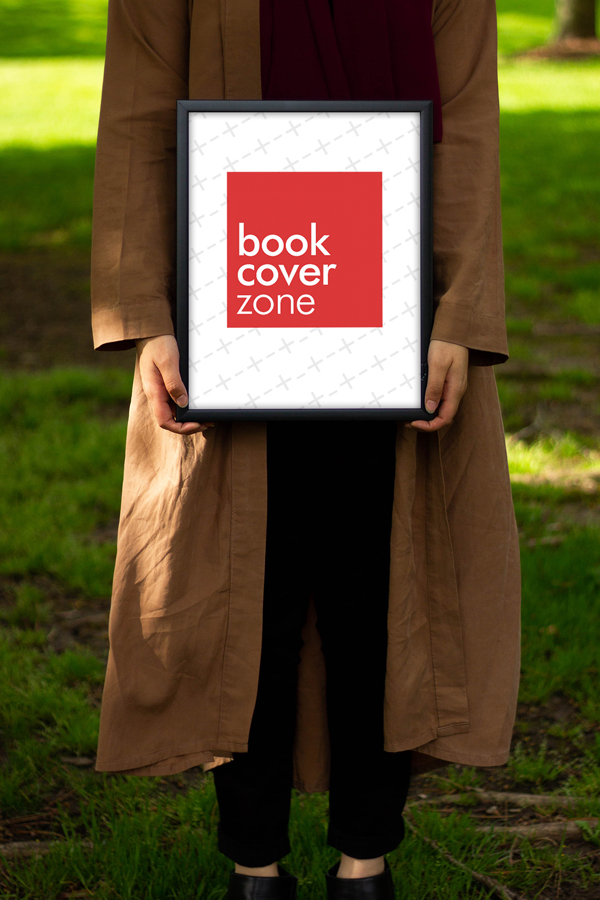 Woman Holding Photo Frame Outdoors
