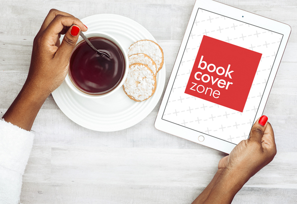 Woman Holding iPad While Enjoying Coffee