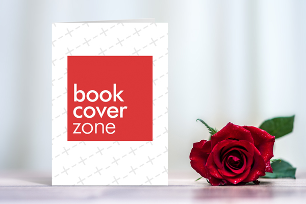 Standing Postcard Invitation Next to a Red Rose
