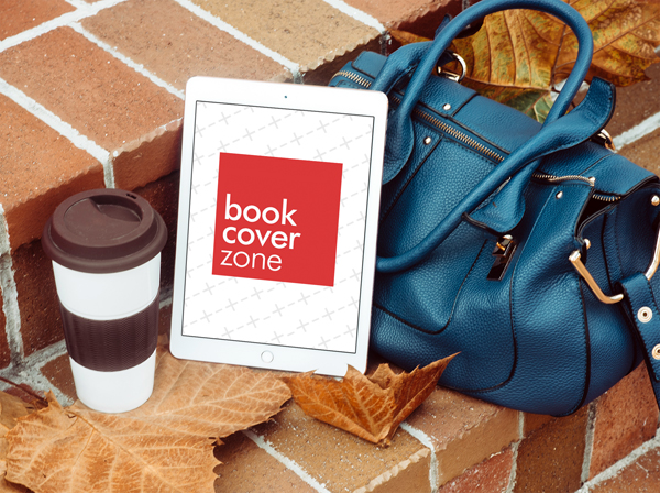 iPad Next to Handbag and Coffee