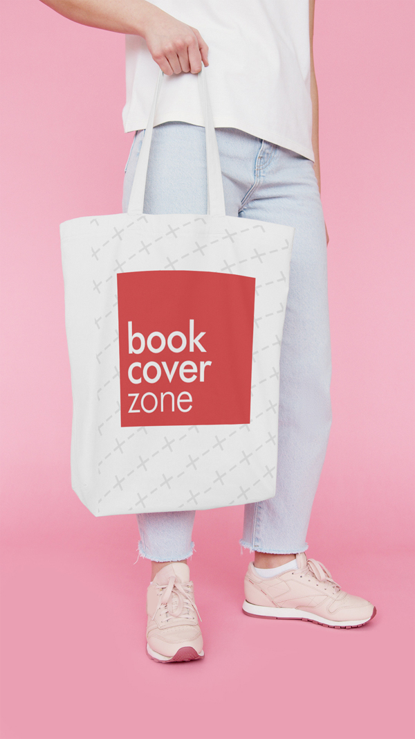 Woman Holding Tote Bag on Pink Background