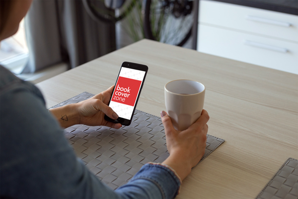 Woman Using Smartphone While Enjoying Coffee