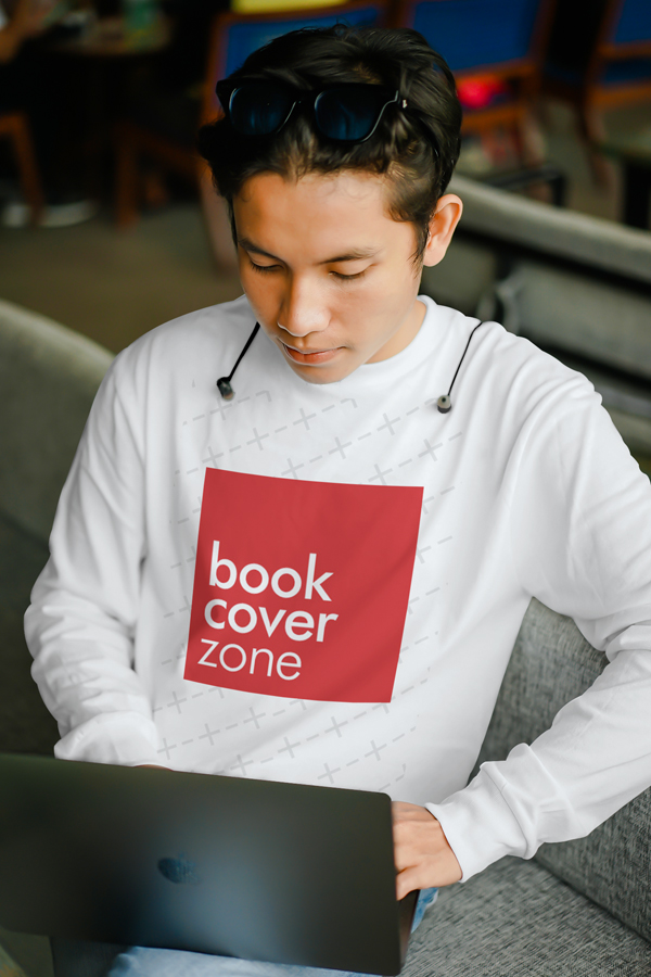 Young Man Browsing on Laptop