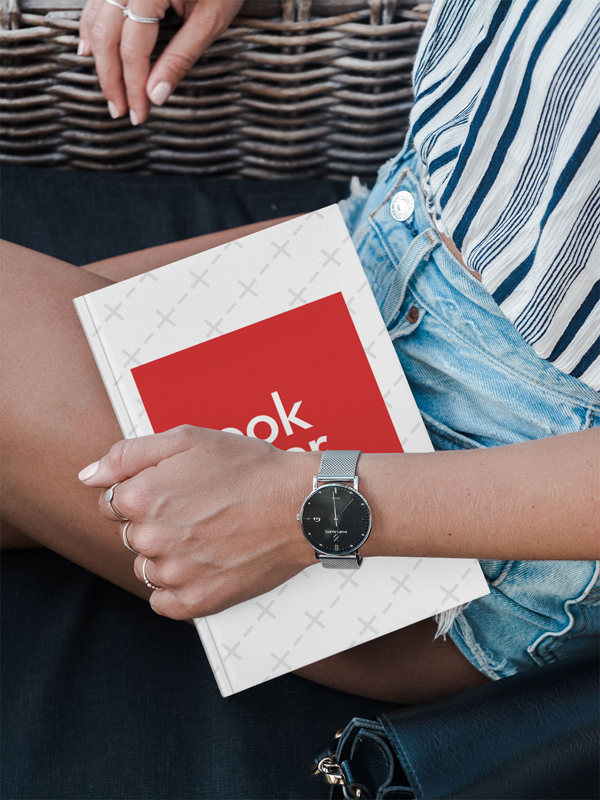 Young Woman Holding Book Cover Mockup
